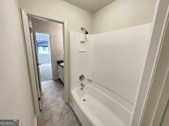 bathroom featuring vanity and shower / bathtub combination