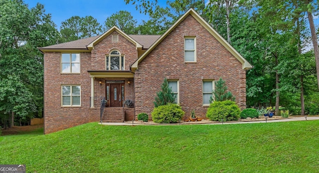 front of property featuring a front lawn