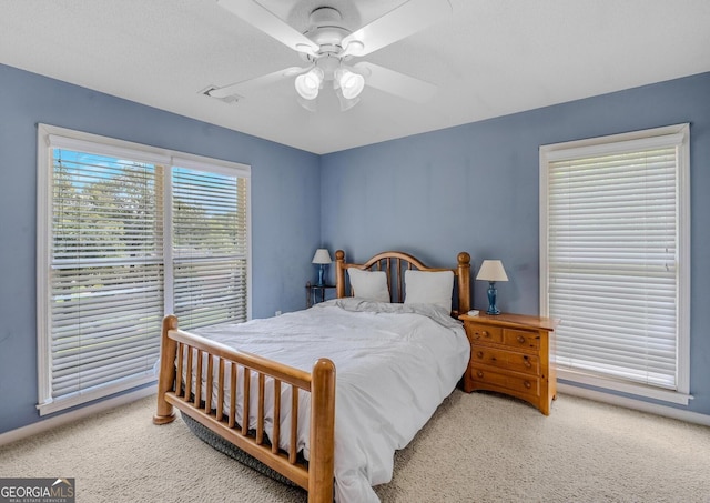 bedroom featuring carpet floors and ceiling fan