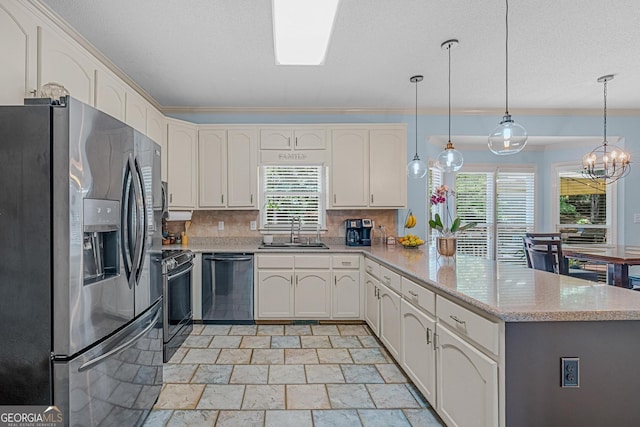 kitchen with decorative light fixtures, sink, white cabinets, kitchen peninsula, and stainless steel appliances