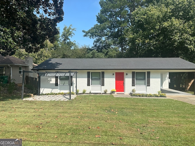 ranch-style home with a front lawn and a carport