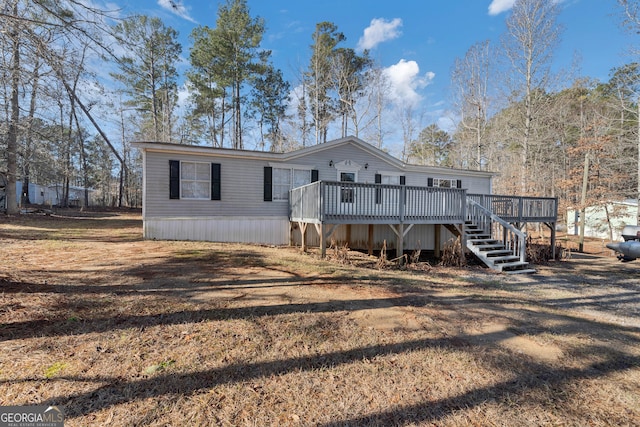 rear view of house with a deck