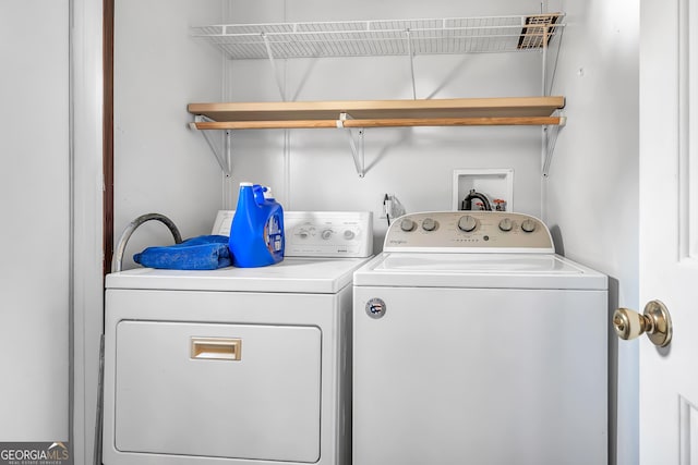 laundry area featuring washing machine and dryer