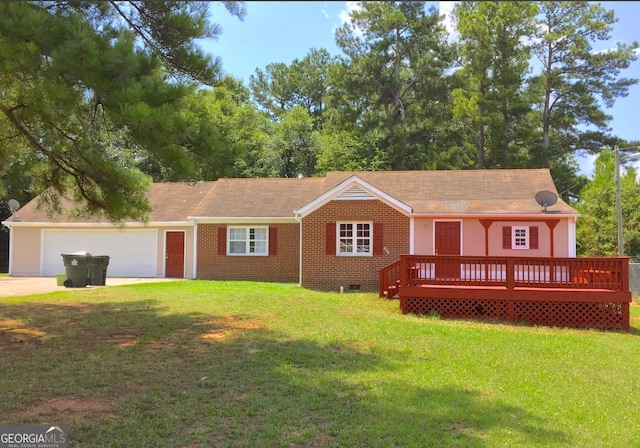 ranch-style house with brick siding, concrete driveway, crawl space, a deck, and a front lawn