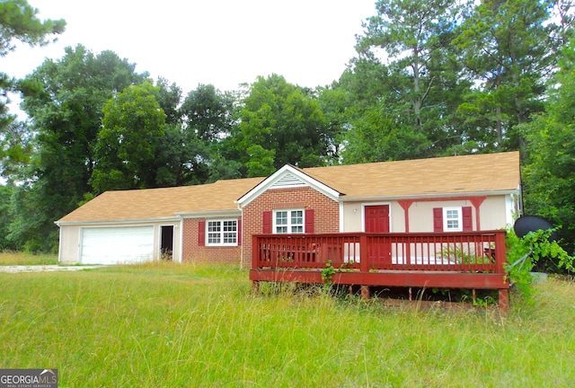 view of front of house with a garage and a wooden deck