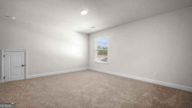 view of carpeted spare room