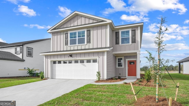 view of front facade with a garage and a front lawn