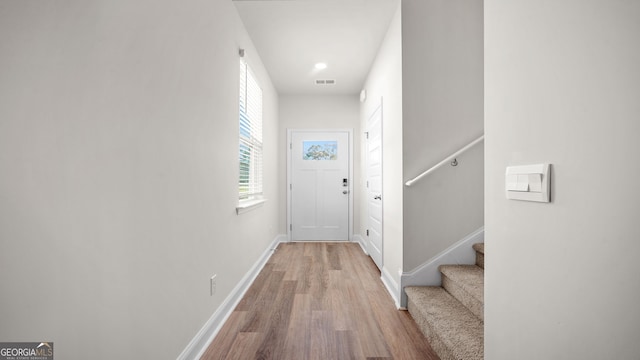 doorway to outside featuring hardwood / wood-style floors