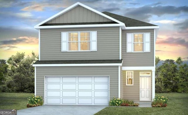 view of front of property with a garage, driveway, and a shingled roof