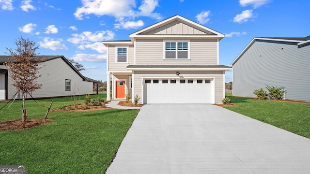 view of front of home with an attached garage, board and batten siding, concrete driveway, and a front lawn