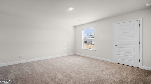 spare room with carpet flooring