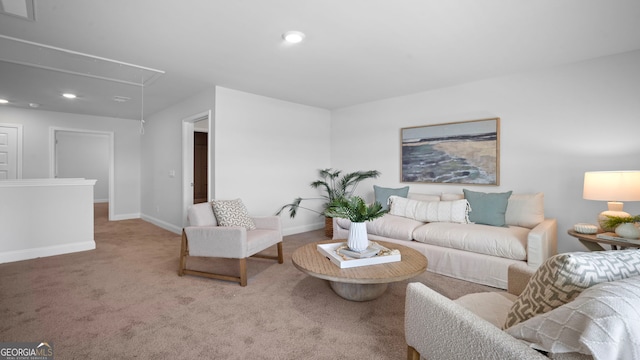 carpeted living room featuring attic access, recessed lighting, baseboards, and visible vents