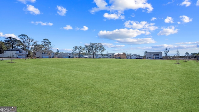 view of yard with a residential view