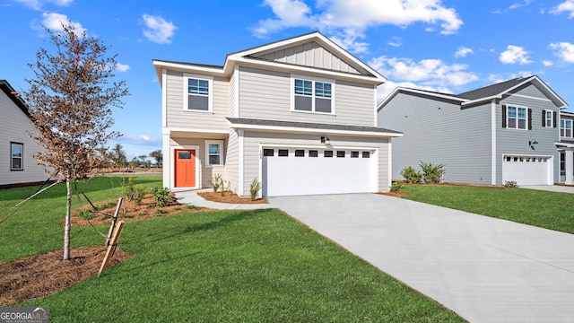 view of front of property featuring board and batten siding, concrete driveway, a garage, and a front yard