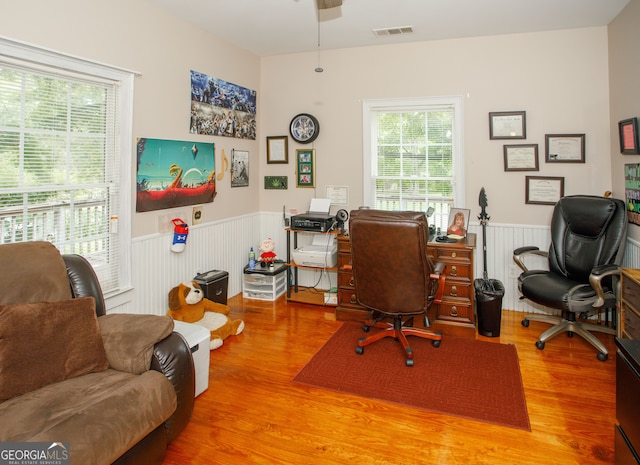 home office featuring hardwood / wood-style flooring