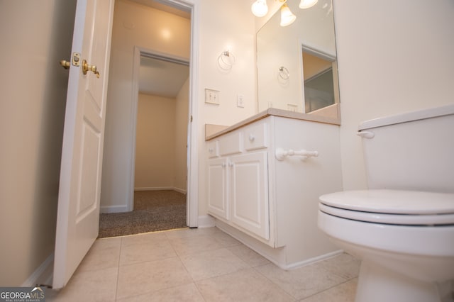 bathroom featuring tile patterned floors and toilet