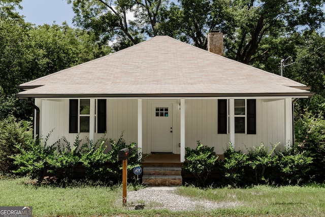 view of front of property featuring covered porch