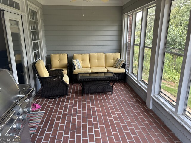 sunroom / solarium with a healthy amount of sunlight