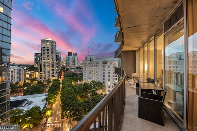 view of balcony at dusk