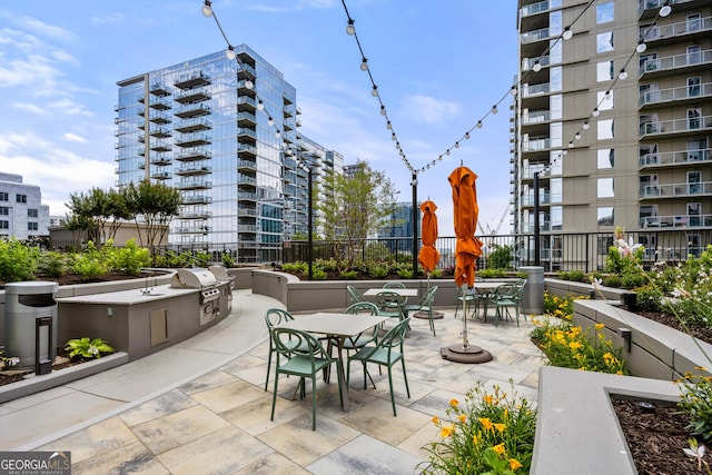 view of patio featuring a grill and area for grilling