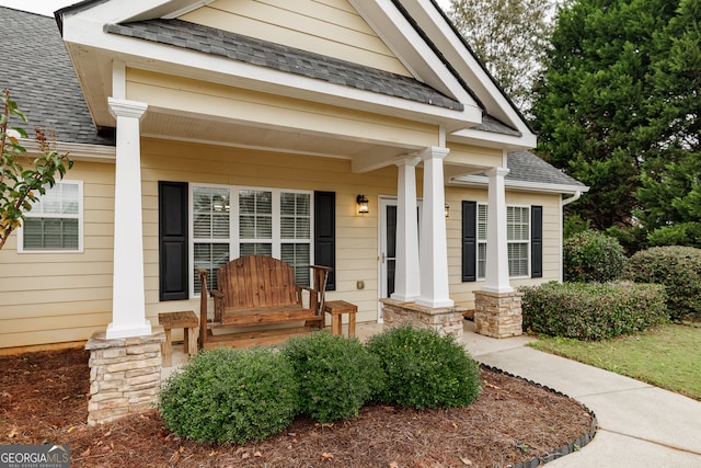 entrance to property with a porch