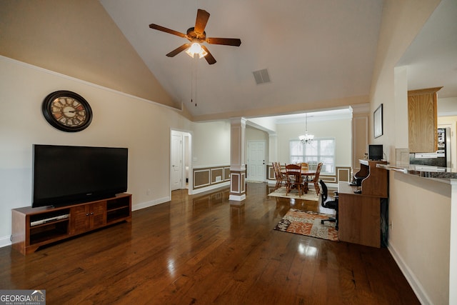 living room featuring high vaulted ceiling, decorative columns, dark hardwood / wood-style floors, and ceiling fan with notable chandelier