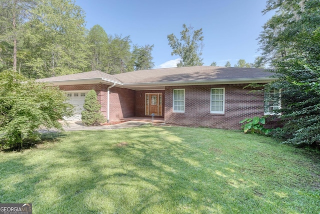 single story home with a garage and a front lawn