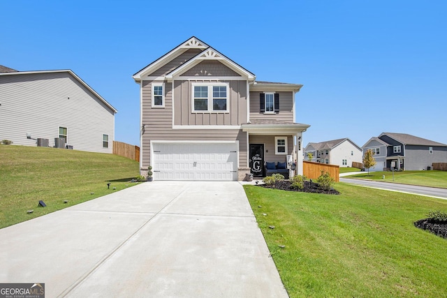 view of front facade featuring a garage and a front lawn