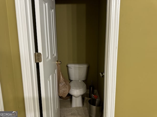 bathroom featuring toilet