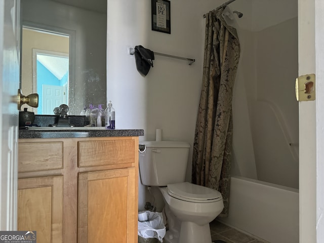 full bathroom featuring shower / bath combination with curtain, tile patterned floors, vanity, and toilet