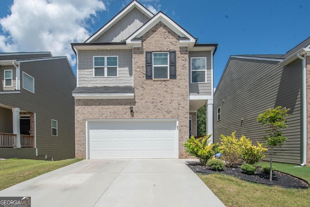 craftsman house featuring a garage, concrete driveway, board and batten siding, and brick siding