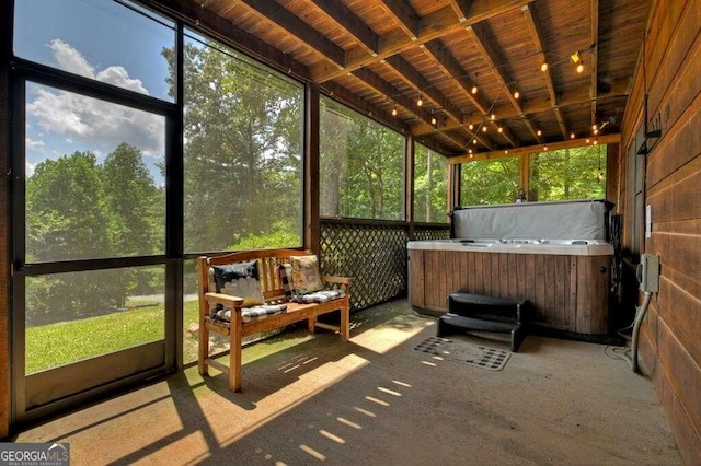 sunroom / solarium featuring a healthy amount of sunlight