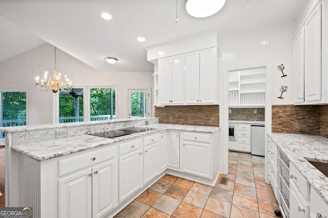 kitchen with light tile patterned flooring, lofted ceiling, white cabinetry, dishwashing machine, and backsplash