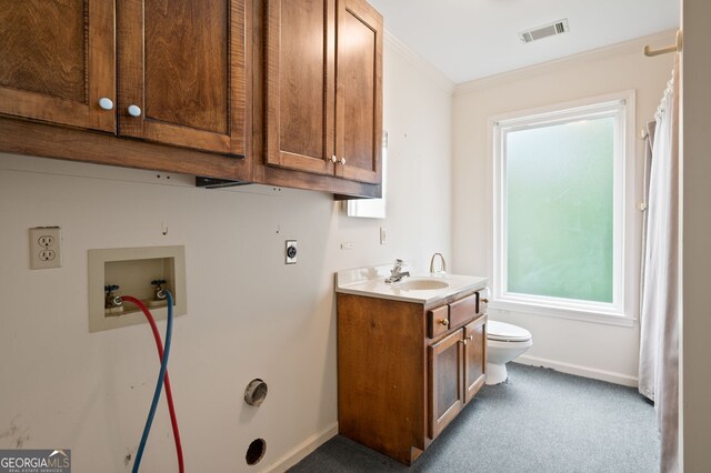 interior space featuring a healthy amount of sunlight, light colored carpet, hookup for an electric dryer, and washer hookup