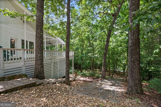 view of yard featuring a wooden deck