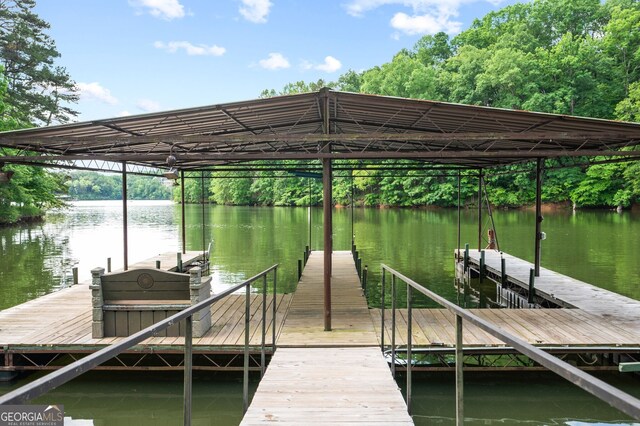 dock area featuring a water view