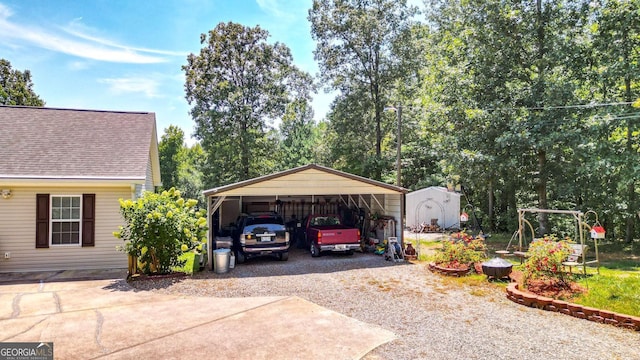 view of home's exterior featuring a storage unit and a carport