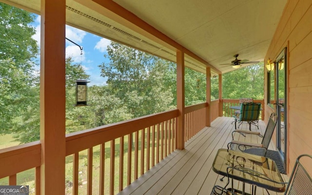 wooden deck with ceiling fan