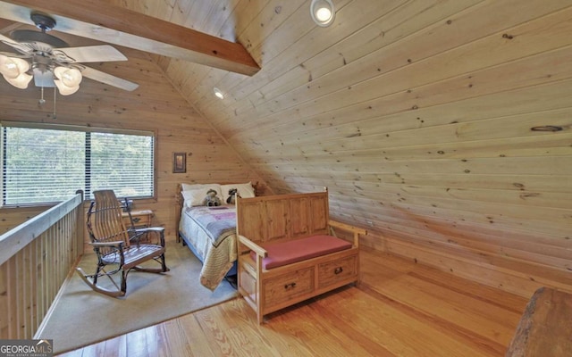 bedroom featuring vaulted ceiling with beams, wood walls, wood ceiling, ceiling fan, and light hardwood / wood-style floors