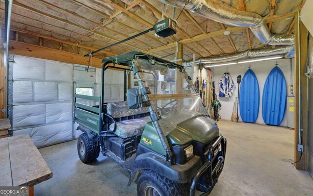 garage featuring a garage door opener