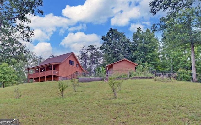 view of yard with a deck