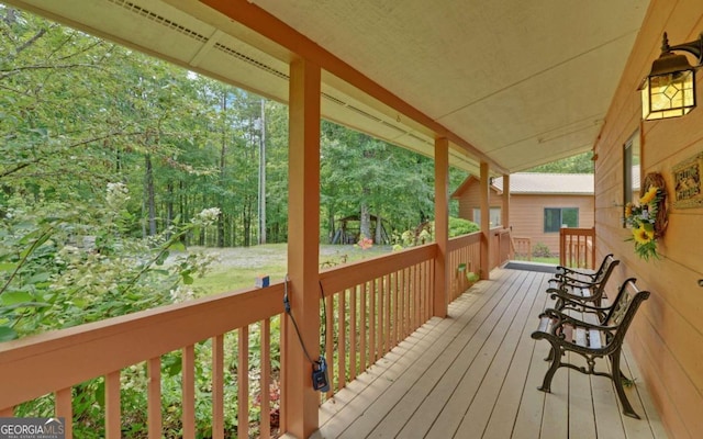 wooden deck featuring a porch