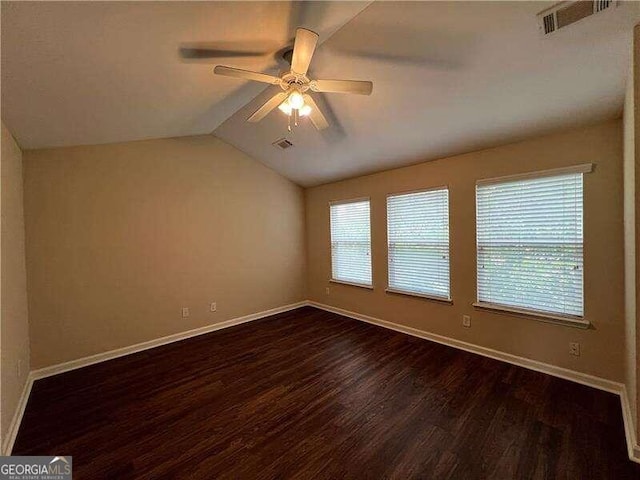 unfurnished room with lofted ceiling, hardwood / wood-style flooring, and ceiling fan