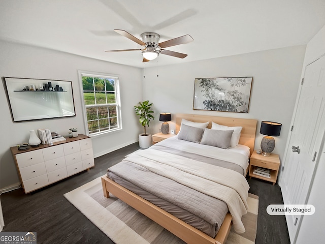 608 Summer Pl, Norcross, GA 30071 - bedroom featuring baseboards, a ceiling fan, and wood finished floors