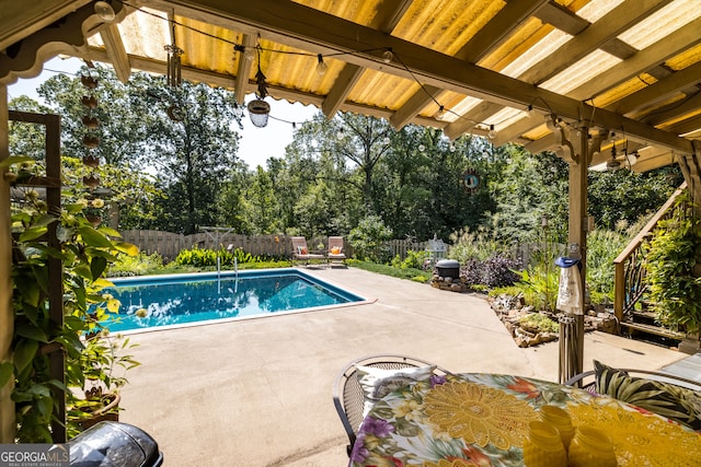 view of pool featuring a patio area