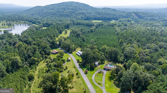 aerial view featuring a water and mountain view