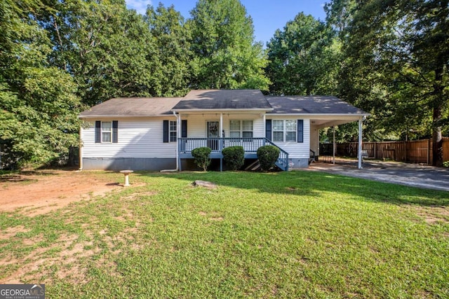 ranch-style home with a front yard, a carport, and covered porch