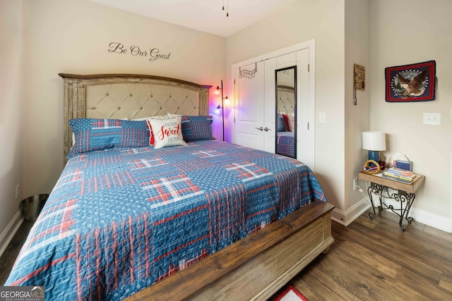 bedroom featuring hardwood / wood-style flooring and a closet