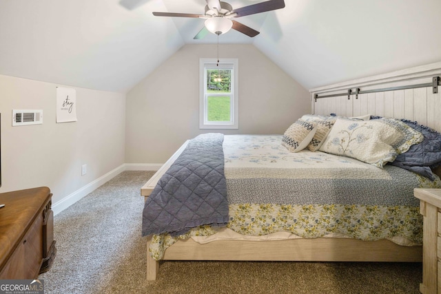 carpeted bedroom with ceiling fan and lofted ceiling