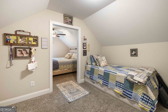 bedroom featuring carpet, lofted ceiling, and ceiling fan